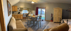 Panoramic shot of the interior of a vacation rental cabin