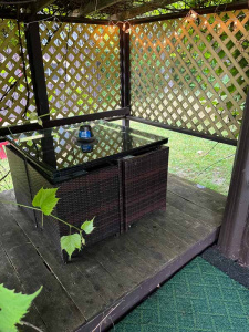 Table on the front porch of a cabin