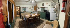 Panoramic shot of the interior of a vacation rental cabin