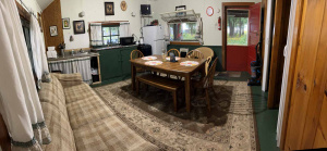 Panoramic shot of the interior of a vacation rental cabin