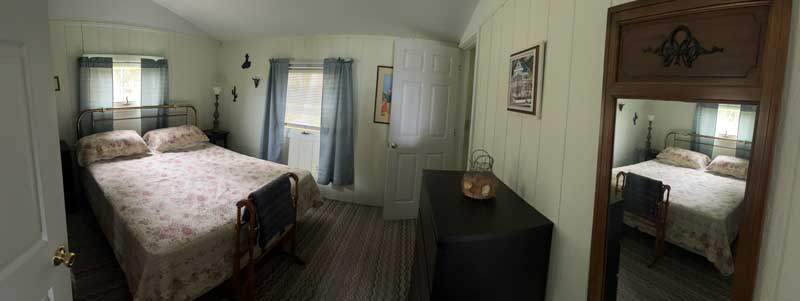 Panoramic shot of the interior of a vacation rental cabin